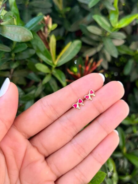 Brinco baby laço rosa