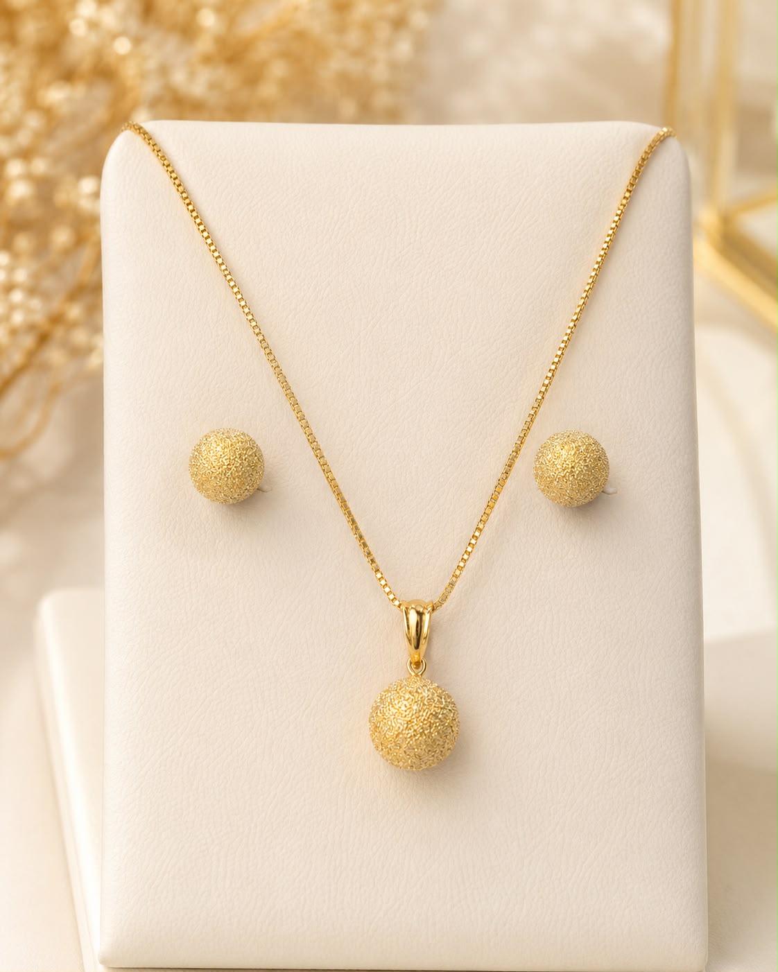 Conjunto esfera dourada